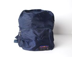 Excellent classic 90s backpack Made by Sports Graphics Please consult measurements Height- 17 inches Width - 15 inches Depth - 6 inches Nylon bag, adjustable straps.  Please message with questions! bg20 Blue Camping Backpack, Blue Backpack For Camping, 80s Backpack, 90s Backpack, Daypack Backpack, Sports Graphics, Nylon Bag, Backpack Purse, Vintage 1970s