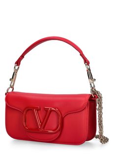 Height: 11cm Width: 20cm Depth: 5cm. Detachable metal chain strap . Single top handle. Front flap with snap button closure. Front metal logo detail Red Valentino Bag, Trendy Logo Shoulder Bag For Evening, Designer Rectangular Shoulder Bag With Metal Logo, Designer Evening Bag With Metal Logo, Party Leather Shoulder Bag With Metal Logo, Top Handle Shoulder Bag With Logo For Evening, Designer Evening Bags With Metal Logo, Designer Bag With Chain Strap, Modern Evening Bags With Logo