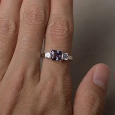 This is a gorgeous handmade creation. Its beauty is its simplicity & Elegance. The 6*6 mm princess cut faceted lab Alexandrite is crafted in solid sterling silver and with rhodium plated. All item is sent in a beautiful gift box If you have any idea of design your ring,pls contact me directly. You can realize more lovely stuff clicking the link https://www.etsy.com/shop/knightjewelry?refshopsection_shophome_leftnav Please leave the correct address and you phone number for delivering successf Princess Cut Jewelry With Accent Stones, Cubic Zirconia Princess Cut Wedding Ring With Accent Stones, Princess Cut Diamond Ring With Accent Stones For Promise, Princess Cut Cubic Zirconia Wedding Ring With Accent Stones, Cubic Zirconia Asscher Cut Ring With Accent Stones, Square Cut Wedding Diamond Ring With Accent Stones, White Gold Sapphire Promise Ring Square Cut, White Gold Square Cut Sapphire Promise Ring, Square Cut Rings With Accent Stones For Wedding