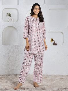 "A beautiful soft Pure Cotton night suits for winter .This is beautifully solid by the artisans of India. this is perfect gift for birthday party , gift to mom , bridesmaid . Fabric - Pure Cotton Color -  Pink Sizing -: Our sizing in inches .Please refer the sizing below-: Size of top-: S- Bust -36\"  , Shoulder - 15''  M-Bust -38\"  , Shoulder - 15.5\",  L- Bust -40\"  , Shoulder - 16\", XL-Bust -42\"  , Shoulder - 16.5\", 2XL-Bust -44\"  , Shoulder - 17\",  3XL-Bust -46\"  , Shoulder - 17.5\",  Size of Pajama:- S- Waist relax -28\" , Length-37\", Hip-42\" M-Waist relax -30\" , Length-37\", Hip-46\" L-Waist relax -32\" , Length-37\", Hip-48\" XL-Waist relax -34\" , Length-37\", Hip-50\" 2XL-Waist relax -36\" , Length-37\", Hip-52\" 3XL-Waist relax -38\" , Length-37\", Hip-54\" Washing ins Festive Long Sleeve Loungewear Pant Set, Traditional Festive Loungewear Sets, Festive Traditional Loungewear Set, Festive Long Sleeve Loungewear Sets, Festive Cotton Loungewear Sets, Long Sleeve Cotton Sleepwear Gift, Cotton Long Sleeve Sleepwear As Gift, Traditional White Sleepwear For Loungewear, Festive White Long Sleeve Sleepwear