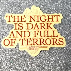 a sticker that says the night is dark and full of terrors on it