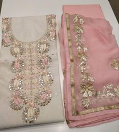 Item Overview ATHARVA Hand Embroidered Salwar Kameez w/Beautiful Embroidery Neck Cream (Off White) Chanderi w/Chiffon Gota Patti Dupatta with Tassels CH Dno. CH1410 Fabric: * Shirt Chanderi Silk- in Light Cream (Off White) 2.5 Mts, with Hand Embroidered Neck * Dupatta: Pure Chiffon Chinnon- Dupatta w/Embroidered Gota Work * Bottom Santoon Silk 2.5 Mts. Excusive Hand Embroidered Party Wear Punjabi Suit. Customization: * Fabrics: Designs Can be made in different Fabrics. * Stitching Available Care Dogri Jewellery, Fancy Dress Material, Silk Kurti Designs, Embroidered Salwar, Suits Punjabi, Desi Wedding Dresses, Gotta Patti, Salwar Kamiz, Pure Chiffon