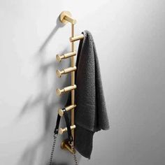 a towel rack is hanging on the wall