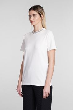 T-Shirt in white cotton, round neck, short sleeves, crystals detail, 100% cottonGender: WomenMaterial: COTTONColor: WHITEMade in: ITProduct ID: 395070_GWP01220P000673*Import tax/duty will be calculated at checkout (If applicable) White Rhinestone Crew Neck Top, Rhinestone Cotton Crew Neck T-shirt, Casual White T-shirt With Rhinestones, Cotton T-shirt With Rhinestones Short Sleeve, Cotton T-shirt With Rhinestones And Short Sleeves, Cotton Short Sleeve T-shirt With Rhinestones, Golden Goose, White Cotton, Round Neck