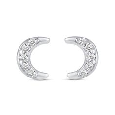 She'll love the celestial theme of this charming diamond three-pair stud earrings set. Crafted in sterling silver, this set features dainty diamond-touched earrings - one pair each of curved lightning bolts, crescent moons and four-pointed stars. Captivating with 1/10 ct. t.w. of diamonds and a bright polished shine, these earrings secure with push-screw backs. Elegant Crescent Diamond Earrings, Celestial Earrings With Diamond Accents For Anniversary, Moon Shaped Sterling Silver Jewelry With Diamond Accents, Crescent Diamond Jewelry For Formal Occasions, White Crescent Diamond Jewelry, Celestial White Gold Jewelry With Brilliant Cut, Celestial Diamond White Jewelry, Celestial White Gold Diamond Jewelry, Celestial Style Jewelry With Brilliant Cut