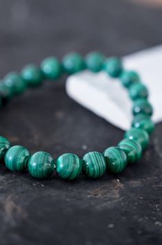 Wear your Malachite bracelet every day to remember that you are powerfully creating the life you desire. You are on a path of change, growth & transformation and it's beautiful how far you've come. Malachite is a stone of change, transformation, and growth. It encourages risk-taking, letting go of old stories that no longer serve you, and breaking free from ties that keep you from evolving. Releasing negative experiences and old traumas, this crystal is truly a stone of personal freedom! AAA Mal Personal Freedom, Malachite Bracelet, Breaking Free, Mala Necklace, Don't Give Up, Bracelet Sizes, Turquoise Bracelet, Gemstone Beads, Sale Items