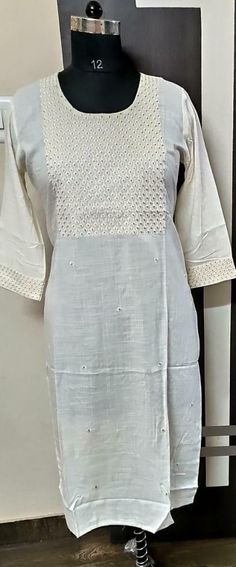 Quality: 100 % Guaranteed Stitched: Yes Full Stitched Sleeve length: 3/4 sleeve Pockets: No Leg/hem length: Mid-calf Neckline: Boat Kurta style: Straight Fabric technique:  Embroidered Pair Up This Kurti With Leggings, Plazo, Pants etc. Wash Care: Machine Wash & Hand Wash In Cold Water Using Mild Detergent. Shipping - We use globally known Logistics for best services like Fed-Ex, DHL, India Post. It usually takes around 7 - 15 day to deliver in Standard Delivery OR 3 - 7 Day in Express. Return - We gladly accept return in light of Etsy Guidelines. Please contact us before raising a Return Request, we may be more useful in resolving your issues. Spring Embroidered Kurta With 3/4 Sleeves, Resham Embroidery Kurta With 3/4 Sleeve, Fitted Cotton Kurta With 3/4 Sleeves, Traditional Embroidered Kurta With 3/4 Sleeves, Cotton Embroidered Top With 3/4 Sleeves, Traditional Embroidered 3/4 Sleeve Kurta, Cotton Chikankari Embroidered Straight Kurta, Cotton Chikankari Embroidered Long Sleeve Top, Fitted Embroidered Top With Chikankari Embroidery