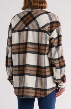 A rustic plaid print adorns a cozy brushed twill shirt-jacket constructed in a slouchy silhouette for laid-back appeal. 28 1/2" length Front button closure Spread collar Chest button-flap patch pockets Lined 100% polyester Dry clean Imported Winter Flannel Outerwear With Relaxed Fit, Winter Outerwear In Flannel With Relaxed Fit, Winter Relaxed Fit Flannel Outerwear, Relaxed Fit Plaid Flannel Shacket, Brown Relaxed Fit Shacket For Fall, Oversized Plaid Flannel Shacket, Oversized Plaid Shacket For Winter, Plaid Flannel Outerwear Relaxed Fit, Plaid Flannel Relaxed Fit Outerwear