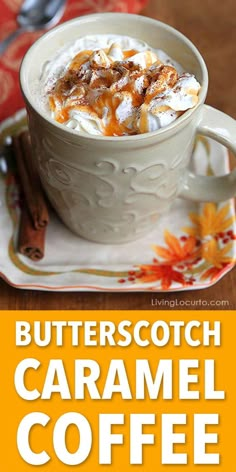 butterscotch caramel coffee is served in a white cup with whipped cream on top