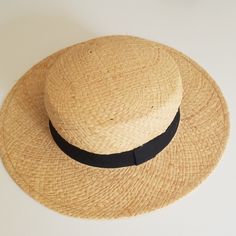 Raffia Straw Hat With Black Band, Never Worn, New With Tags, Perfect Condition Natural Fedora Boater Hat, Natural Brimmed Boater Hat, Natural Color Wide Brim Boater Hat, Vintage Flat Crown Hats For Beach, Vintage Flat Crown Hats For The Beach, Black Sleeveless Shirt, Straw Panama Hat, Beaded Moccasins, Flannel Tunic