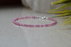 "Natural Pink Tourmaline Bracelet is perfect for Heart Chakra Bracelet. A gorgeous bracelet of precious pink tourmaline finished with a Sterling Silver clasp. Wear this bracelet on its own or stack it with your other favorite bracelets to create your own story. This bracelet is dainty, delicate and sparkly. . ❗️Sign up to our Newsletter and get 15% OFF your order (copy this link to browser search) - https://forms.gle/R74xLdL1MSmC9Apn6 ❗️ . MEASUREMENTS: Gemstones: Pink Tourmaline Beads size: 2mm Elegant Pink Faceted Bracelet, Pink Faceted Bracelet Jewelry, Pink Faceted Jewelry Bracelet, Pink Gemstone Bracelets For Gift, Delicate Pink Round Bracelets, Dainty Pink Round Bracelet, Minimalist Pink Round Bracelet, Dainty Pink Beaded Bracelets With Gemstone Beads, Elegant Pink Tourmaline Bracelets