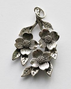 This is a listing for 925 Sterling Silver Dogwood Flowers Component Dimensions: 26.6 x 18.5mm Thickness: 3.6mm Weight: 3.2g This component is ready to use as a charm but can be easily reworked for other projects. Silver Flower Charm Jewelry, Whimsical Silver Flower-shaped Jewelry, Silver Flower Charm Pendant, Dogwood Jewelry, Delicate Silver Flower-shaped Charm Necklace, Silver Flower-shaped Charm Necklace For Her, Dogwood Flowers, Jewelry Design Inspiration, Metal Clay