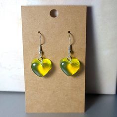 These gummy heart earrings are perfect to bring you back to your childhood! They come in any color of the rainbow, so you can be sure to get the color you like! They are made with sterling silver hooks to ensure that your ears are not affected! Heart Pendant Earrings With Ear Wire For Gift, Heart Shaped Earrings With Ear Wire For Gifts, Heart Pendant Earrings With Ear Wire As Gift, Green Heart Beads Earrings For Gift, Green Heart Drop Earrings For Gifts, Green Nickel-free Heart Earrings As Gift, Green Earrings With Heart Beads For Gifts, Heart Pendant Earrings With Beads For Gift, Heart Pendant Earrings With Heart Beads