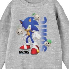 Stay comfy and cozy while you celebrate your favorite video games with this Sonic Frontiers shirt. The shirt features an image of Sonic surrounded by koco creatures while blue letters spell out his name. The game's logo appears in black letters below the image. The shirt comes in an athletic heather long sleeve crew neck. Fans of the Sonic Frontiers video games will love this comfy shirt. Themed Character Print Crew Neck Top, Themed Crew Neck Top With Character Print, Themed Cartoon Print Tops For Streetwear, Themed Long Sleeve Tops With Cartoon Print, Themed Long Sleeve Fan Merchandise Tops, Themed Streetwear Tops With Cartoon Print, Themed Long Sleeve Top With Cartoon Print, Themed Long Sleeve Tops With Graphic Print, Themed Long Sleeve Tops With Letter Print