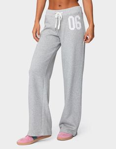 Reach Your Ultimate Level Of Coziness, While Still Feeling On-Trend With These Perfect Sweatpants. Sweatpants. Straight Leg Fit. Adjustable Tie Waist. Embroidered Patch. 50% Cotton, 50% Polyester. Model Wears Size S. Model Height Is 5'8. Item Care: Machine Wash At Maximum 30ºc, Do Not Bleach, Do Not Tumble Dry, Iron At A Maximum Of 110ºc, Do Not Dry Clean. | Edikted 06 Sweatpants Clothes Christmas List, Shirts To Wear With Sweatpants, Aeropostale Flare Sweatpants, 2000s Sweatpants, Garage Sweatpants, Good Sweatpants, Bestie Clothes, Cute Sweat Pants, Open Leg Sweatpants