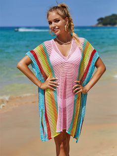 This oversized knit sweater is perfect for a day at the beach or a casual night out. With its playful stripes and comfortable fit, you'll feel stylish and relaxed all day long. Made from high-quality materials, this sweater is a must-have for any beach style wardrobe. Size Guide: Model is 5’8” tall, and has a 34.2” bust, 24.9”waist, & 37.7” hips. She is wearing a S / US 4 / AU 8. This sweater is true to size. Material: 100% Polyester. Key Features: V-Neckline. Short sleeve. Coverup. Crochet Knit. Side Slits. Not lined. Oversized fit. Maternity friendly. No closures. Care Instructions: Machine wash / Cold hand wash Plus Jumpsuit, Blue Zone, Casual Night Out, Tee Shirt Dress, Activewear Sets, Kids Outerwear, Double Take, Beach Vibes, Modern Chic