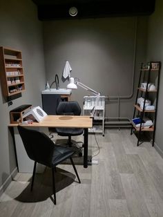 an office with a desk and chair in it