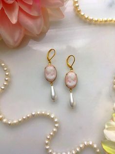 Handmade pink cameo Victorian style pearl drop earrings. Made with glass pearls. The earrings measure approximately 2 1/4" long. The brass settings are made in the USA. Baroque Earrings, Cameo Earrings, Vintage Pearl, Vintage Pearls, Earrings Vintage, Pearl Drop Earrings, Victorian Style, Pearl Drop, Rococo