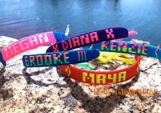 How to order: Step 1: Pick the colors for the text Step 2: Pick the colors for the band Step 3: Pick design, not required Step 4: NAME ON BRACELET And now you are set! Text: ARE ALL CAPITAL ON BRACELET Colors available: see photos, all colors are available! Symbols available to be made: ♥, [ ], #, +, !, /, < >, WINGS, =, STAIRCASE, NUMBERS(If there are any that I don't have listed here, please message me a photo and we can go from there 100% Nylon filament cord adjustable bracelet. One Siz Friendship Bracelets With Names, Friendship Bands, Bracelet Colors, Toddler Bracelet, Bff Bracelets, Name Bracelets, Classroom Gifts, Dream Catcher Earrings, Surfer Bracelets