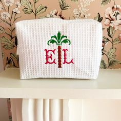 Make her day special with our Embroidered Personalised Monogram Makeup Bag! This chic cosmetic pouch is the perfect gift for her birthday or any occasion. Personalize it with her initials for a thoughtful touch. Whether she's headed to the beach or on a tropical getaway, this quilted travel case is a stylish accessory for organizing her beauty essentials. Elevate her beauty routine with our Tropical Beach Accessories - the perfect blend of fashion and functionality! ITEM DESCRIPTION: > Size 22.9 Personalized White Zipper Pouch Cosmetic Bag, Embroidered White Rectangular Pouch, White Embroidered Rectangular Pouch, Personalized Rectangular Cosmetic Bag Gift, Monogrammed Makeup Bags, Monogram Cosmetic Bag, Cute Makeup Bags, Style Chart, Monogrammed Napkins