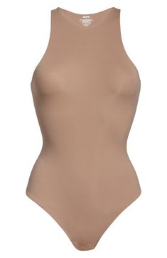 Sculpt your body's natural shape with a high-neck bodysuit from Kim Kardashian West's SKIMS that holds you in and lifts you up in all the right places. Reflecting the brand's passion for highly technical shapewear solutions for every body, this everyday piece has whisper-soft, seamless construction, high-cut legs and a thong back that remains invisible under clothing. Style Name:Skims Fits Everybody High Neck Bodysuit (Regular & Plus Size). Style Number: 6125046. Elegant Seamless High-stretch Bodysuit, Luxury High Neck Fitted Bodysuit, Seamless High-cut Leg Shapewear Bodysuit, Sleek High-cut Bodysuit With Lined Body, Moisture-wicking High Stretch Sleeveless Bodysuit, High Neck Bodysuit, Diy Kits Gift, Natural Shapes, High Cut