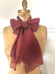 This rectangular sheer scarf is burgundy.  It has a blue iridescent/ombre effect to it. Condition:  Light wear, but in overall good condition with no stains or rips. Fabric:  Synthetic Measurements:  64" x 12" Strawberry Dress, Sheer Scarf, Black Peach, History Fashion, Ombre Effect, Blue Ombre, Pantone Color, Scarf Accessory, Fashion Beauty