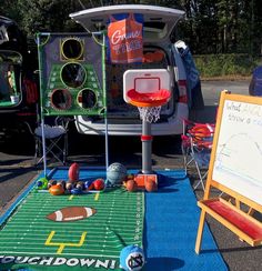 an outdoor basketball court is set up in the parking lot for kids to play with