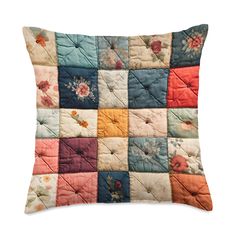 a multicolored patchwork pillow with flowers on it