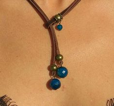 "Lariat necklace, leather necklace, stone necklace, necklace for woman belong to bohemian jewelry as well as boho jewelry. A gemstone jewelry piece carefully designed and crafted by EndiaDesign. Show off a bohemian style with this unique leather necklace made of high quality cow leather, agates stones in blue colour and a beads in antique bronze tone. You could wear this original gemstone necklace on any occasion, formal or casual, making you look super chic and cute. Agate Healing Properties ♥ Festival Lariat Necklace With Natural Stones, Adjustable Lariat Necklace For Festivals, Handmade Lariat Festival Necklace, Handmade Festival Lariat Necklace, Unique Adjustable Lariat Necklace, Bohemian Lariat Necklace With Natural Stones For Festivals, Handmade Lariat Necklace For Festivals, Adjustable Dangle Lariat Necklace For Festival, Handmade Long Lariat Necklace For Festivals