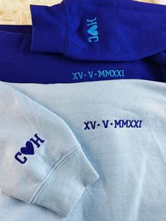 "Couple Hoodies, Roman Numeral Anniversary Matching Wife Hoody, Custom Date Embroidered Initial Pullover Jumper, GF BF Matching Birthday Gift Specifications: We provides the best quality and value when it comes to personalization/customization on clothing products and accessories. We are here to digitize your designs, logos, pictures, and imaginations to various apparels in an attractive way. This price is for one individual product, to order the set containing \"2 items\" add 2 items separately Blue Crew Neck Hoodie With Embroidered Graphics, Blue Embroidered Crew Neck Hoodie, Blue Hooded Hoodie With Embroidered Graphics, Long Sleeve Cotton Sweatshirt For Anniversary, Blue Long Sleeve Hoodie With Custom Embroidery, Blue Hoodie With Custom Embroidery, Blue Custom Embroidered Hoodie, Long Sleeve Tops With Letter Embroidery For Birthday, Couple Hoodies