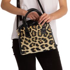 This Cheetah print shoulder bag is all about custom style and practicality that is long-lasting. Perfect for gift giving, birthdays, Christmas, Mother's Day or a gift for yourself. Animal print design will have friends and family asking where did you find it. Featuring a single zippered top closure as well as a removable, adjustable fabric shoulder strap, it can double as a stylish handbag that is perfect for any & all occasions.  .: 100% high-grade PU leather .: Polyester lining .: Black handles .: Removable and adjustable PU leather shoulder strap .: One size .: Double-sided printImage Leopard Print Rectangular Shopping Bag, Leopard Print Shoulder Bag With Animal Design, Trendy Rectangular Leopard Print Bags, Leopard Print Rectangular Satchel For Shopping, Leopard Print Rectangular Bag With Adjustable Strap, Tortoiseshell Bags For Everyday Use, Black Rectangular Shoulder Bag With Animal Design, Rectangular Black Shoulder Bag With Animal Design, Chic Leopard Print Satchel For Daily Use