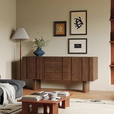 a living room filled with furniture and bookshelves next to a wall mounted book shelf