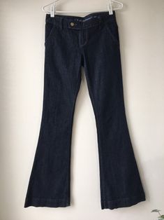 "Extra long vintage denim stretch flared Guess Jeans from the 90s. Low rise with Zipper fly and one top button Size: 26/36 Inseam: 36\" length from waist to hem: 43\" Hips: 38 '' diameter of Hem: 22\" Condition: Good vintage , 1 back pocket button missing, and some fraying on the hem Fabric: 98% Cotton, 2% Spandex Brand: Guess Made in Mexico Shipping was combined" Summer Linen Shirt, Casual Earrings, Summer Linen, Hem Jeans, Layered Tops, Flared Jeans, Guess Jeans, Plus Size Blouses, Vintage Denim