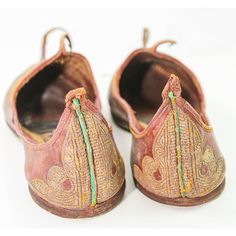 Antique Leather Mughal Moorish Turkish Ottoman Shoes with Gold Embroidered. A pair of rare late 19th century hand stitched and hand tooled leather shoes with hand embroidered with gilt metallic threads. Measures: 11" x 3.5" x 3" to the top of the curl. Circa 1880s. For decor purpose only. Amazing antique Mughal gold embroidered traditional Islamic Raj Indian leather shoes fit for a Maharaja embellished with gold metal thread called zardosi and salma sitara embroidery, gold metal embroidery. Arab Traditional Leather Shoes With Leather Sole For Festivals, Traditional Leather Shoes For Festivals, Tooled Leather Shoes, Metal Embroidery, Moroccan Wedding Blanket, Rare Shoes, Turkish Ottoman, Antique Collectors, Curl Styles