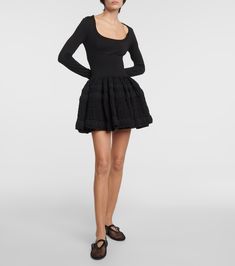 Find ALAÏA Alaïa Crinoline Wool-blend Minidress on Editorialist. Material: 81% wool, 12% polypropylene, 7% polyamide. Care instructions: dry clean. Made in Italy. Designer color name: Noir Alaia. Material II: 92% wool, 6% polyamide, 2% polyurethane. Designer Fitted Winter Dress, Spring Evening Wool Dresses, Party Dress With Voluminous Skirt For Fall, Black Wool Evening Dress, Black Wool Dress For Evening, Chic Fall Dress With Voluminous Skirt, Designer Fitted Fall Dresses, Designer Fitted Dress For Fall, Black Fitted Wool Dress