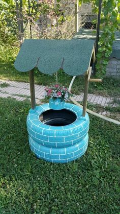 an outdoor toilet made out of old tires