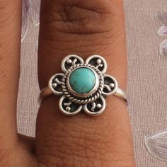 #Mother's Day gift itemsNote: Due to the natural formation of this gemstone. Slight variation in design and color are to be expected. 925 Sterling Silver Turquoise Round Gemstone Ring. Available in different size. Gemstone Name: Turquoise Metal: 925 Sterling Silver Ring Size: Optional Quantity: 1 Piece click more gemstone rings:- https://www.etsy.com/in-en/shop/Shreejaipursilver925?ref=seller-platform-mcnav&search_query=gemstone+ringsValentine's Day Early 2021 Trends Bestseller Shopgift for Sterling Silver Flower Jewelry With Natural Stones, Flower Shaped Sterling Silver Jewelry With Natural Stones, Handmade Spiritual Turquoise Ring For Anniversary, Flower-shaped Natural Stones Jewelry For Gift, Bohemian Flower Ring As A Gift, Flower Shaped Natural Stone Jewelry Gift, Flower-shaped Natural Stone Jewelry Gift, Sterling Silver Turquoise Ring, Perfect As A Gift, Blue Gemstone Flower Ring Gift