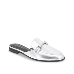 BCBGeneration-Zorie Mule Slip-on the Zorie mules from BCBGeneration for a tailored look. These shoes feature a bit accent across the vamp and a cut-away lip that will effortlessly complement any professional outfit. Silver Slip-on Mules For Party, Silver Slip-on Party Mules, Chic Silver Leather Mules, Silver Flat Mules For Spring, Elegant Flat Mules With Metal Feet, Silver Modern Mules For Spring, Spring Silver Flat Mules, Elegant Silver Mules For Spring, Flat Silver Leather Mules