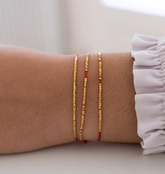 Delicate Silk Bracelet, minimalistic bracelet, wish bracelet, silk friendship bracelet, red string bracelet, simple bracelet, good luck gift by VivienFrankDesigns on Etsy Elegant Gold Beaded Friendship Bracelets As Gift, Elegant Gold Beads Friendship Bracelets As Gift, Gold Minimalist Beaded Bracelets For Party, Minimalist Gold Beaded Bracelets For Party, Gold Minimalist Friendship Bracelets With Round Beads, Elegant Tiny Beads Friendship Bracelets As Gift, Elegant Friendship Bracelets With Tiny Beads As Gifts, Delicate Chain Beaded Bracelets As Gift, Minimalist Gold Beaded Friendship Bracelets