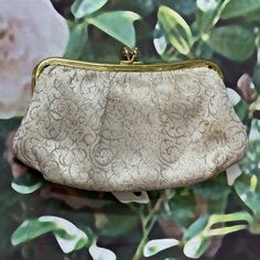 "Vintage 1960's gold brocade pouch by St. Thomas has a scroll design in metallic gold Lurex. It has a gold kiss lock clasp and gold satin interior. Pouch measures 78 inches by 4\"25. Perfect to keep small items. Good condition with a very light small stain on one side. Please see photos for details. All items are vintage that are preowned. All of the items may show some form of wear due to their age. Please kindly remember that these items are anywhere from 30-80 years old. I make every attempt to clearly describe the item, including any flaws or wear to the best of my ability. Returns are not accepted based on the condition of the item. I urge you to the please contact me with any and all questions. I am happy to provide more photos of the item on request." Gold Brocade, Gold Satin, St Thomas, Scroll Design, Purse Pouch, Gold Metal, Coin Purse, Pouch, Etsy Uk