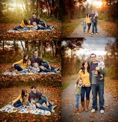 a family is posing for pictures in the woods with leaves on the ground and trees around them