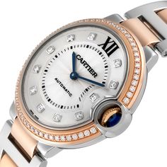 Cartier Ballon Bleu Steel Rose Gold Diamond Ladies Watch W3BB0004. Automatic self-winding movement. Round stainless steel and 18k rose gold case 36 mm in diameter. Fluted crown set with a blue spinel cabochon. 18k rose gold bezel set with original Cartier factory diamonds. Scratch resistant sapphire crystal. Silvered guilloche dial with original Cartier factory diamond hour markers. Blued steel sword-shaped hands. Stainless steel and 18k rose gold bracelet with hidden butterfly clasp. Fits 7" wr Rose Gold Watch With Metal Dial For Anniversary, Rose Gold Watches With Metal Dial For Anniversary, Elegant White Gold Automatic Diamond Watch, Anniversary Rose Gold Automatic Watch, Luxury White Gold Watch With Rotating Bezel, Formal White Gold Watch With Rotating Bezel, Luxury Watches With Rotating Bezel, Rose Gold Automatic Watch For Anniversary, Rose Gold Diamond Watch With Metal Dial