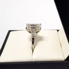 an engagement ring is sitting in a box