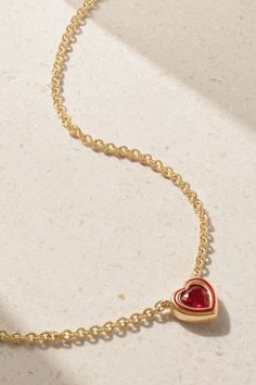 Alison Lou's necklace is part of the 'Madison' collection, which includes delicate pieces featuring a range of colorful stones in varying cuts - it's also the street name of the label's boutique. It's handmade from 14-karat gold and strung with a faceted heart-shaped ruby framed by tonal glossy enamel.