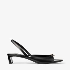 Designed to a modern, graphic silhouette, the Lev sandal is crafted from Nappa leather. Featuring a curved heel, this effortlessly stylish sandal is complemented by gold-tone Diamond hardware. Champagne Sandals, Nappa Leather Bag, Graphic Silhouette, Jimmy Choo Gold, Jimmy Choo Sandals, Latest Sandal, Ageless Style, Leather Heels Sandals, Sneaker Dress Shoes