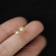 Style: Retro Tiny Round Elegant Cartilage Earrings, Tiny Round Elegant Earrings, Elegant Tiny Cartilage Earrings For Anniversary, Elegant Tiny Round Earrings, 14k Gold Silver Cartilage Earrings, Tiny White Sterling Silver Earrings, Yellow Gold Sterling Silver Cartilage Earrings As Gift, Silver Cluster Earrings In 14k Gold, White Sterling Silver Cluster Earrings For Pierced Ears