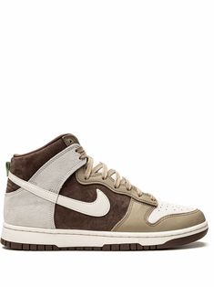 Brown/beige leather Dunk High “Light Chocolate" sneakers from NIKE featuring signature Swoosh logo detail, contrasting panel detail, round toe, front lace-up fastening, logo patch at the tongue, ankle-length, branded insole and rubber sole. These styles are supplied by a premium sneaker marketplace. Stocking only the most sought-after footwear, they source and curate some of the most hard to find sneakers from around the world.. | Nike Dunk High “Light Chocolate" sneakers Brown Lace-up Skate Shoes For Streetwear, Brown Skate Shoes For Streetwear, Brown Urban Sneakers For Streetwear, Urban Brown Sneakers For Streetwear, Brown High-top Sneakers With Speckled Midsole For Streetwear, Brown Lace-up Skate Shoes With Gum Sole, Brown High-top Sneakers With Speckled Midsole, Sporty Brown High-top Sneakers With Speckled Midsole, Nike Urban Brown Sneakers