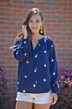 Dot to Trot Blouse :: NEW ARRIVALS :: The Blue Door Boutique Casual Swiss Dot Blouse, Polka Dot Blouse For Summer Brunch, Navy Chic Blouse For Spring, Chic Navy Blouse For Spring, Chic Polka Dot Blouse For Brunch, Casual Swiss Dot Blouse For Work, Navy Fabric, Blue Door, Colorful Fashion