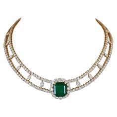 Many different types of necklaces have withstood the test of time, remaining popular throughout history and still prevalent today. The bib necklace is one form seen in Ancient Egyptian paintings of pharaohs, revived in the 20th century, inspired by the Egyptian archaeological discoveries at the Valley of the Kings. This splendid Vassort Vintage Colombian Emerald Diamond Bib Necklace, made in France in the late 20th century, circa 1980s, by the famous French jeweler André Vassort, features an octagonal emerald weighing an estimated 13.20 carats. The emerald is accompanied by report no. 105573, dated 11 March 2019, from the Swiss Gemmological Institute (SSEF), stating that it is a green natural beryl-type emerald of medium intense color saturation and Colombian origin with moderate clarity e Luxury Tsavorite Emerald Necklace In Yellow Gold, Types Of Necklaces, Goth Wardrobe, Barb Wire, Wire Design, Archaeological Discoveries, Jewelry Styles, Valley Of The Kings, French Jewelry