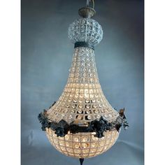 a crystal chandelier hanging from the ceiling